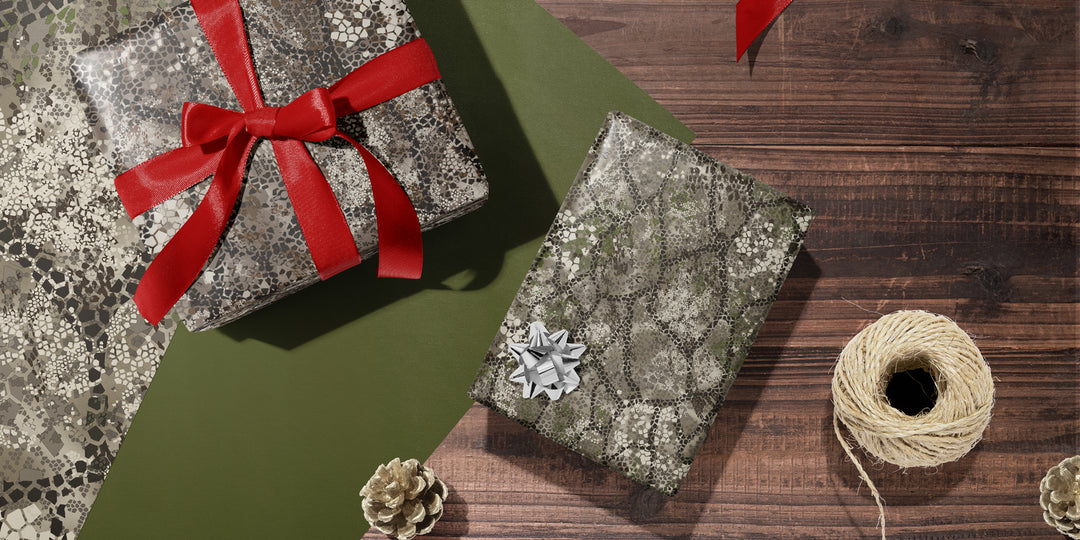 tablescape of presents in camo wrapping paper