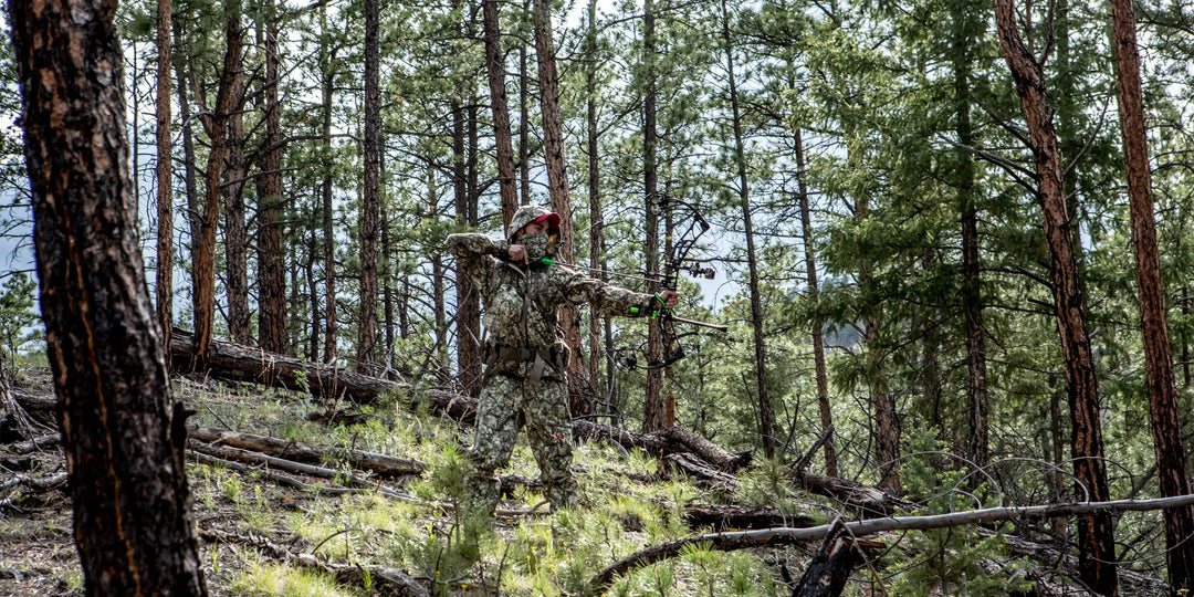 Man hunting big game in a forest