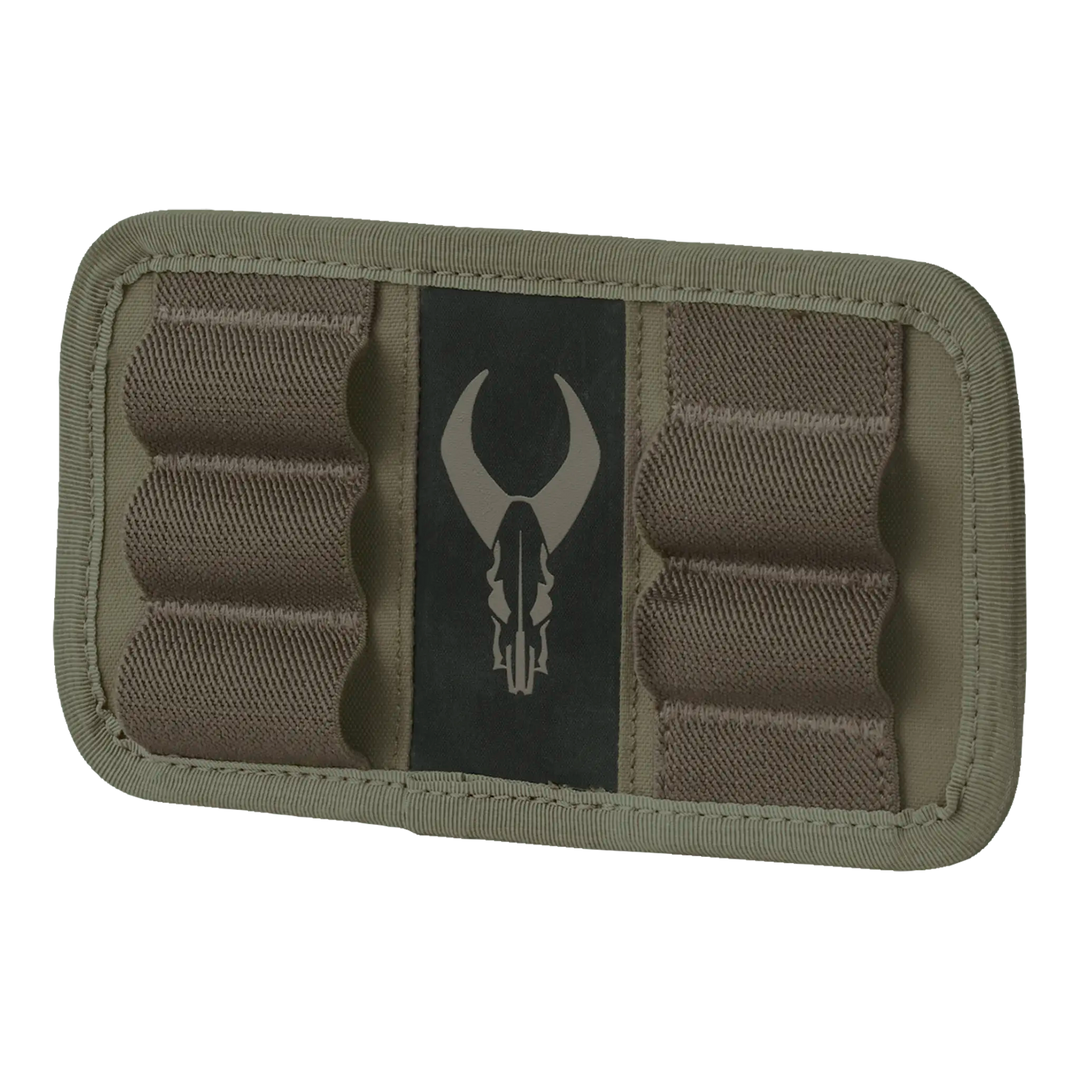 Badlands ammo holder with logo; tan fabric, elastic loops for cartridges, ADA-friendly design for easy access.