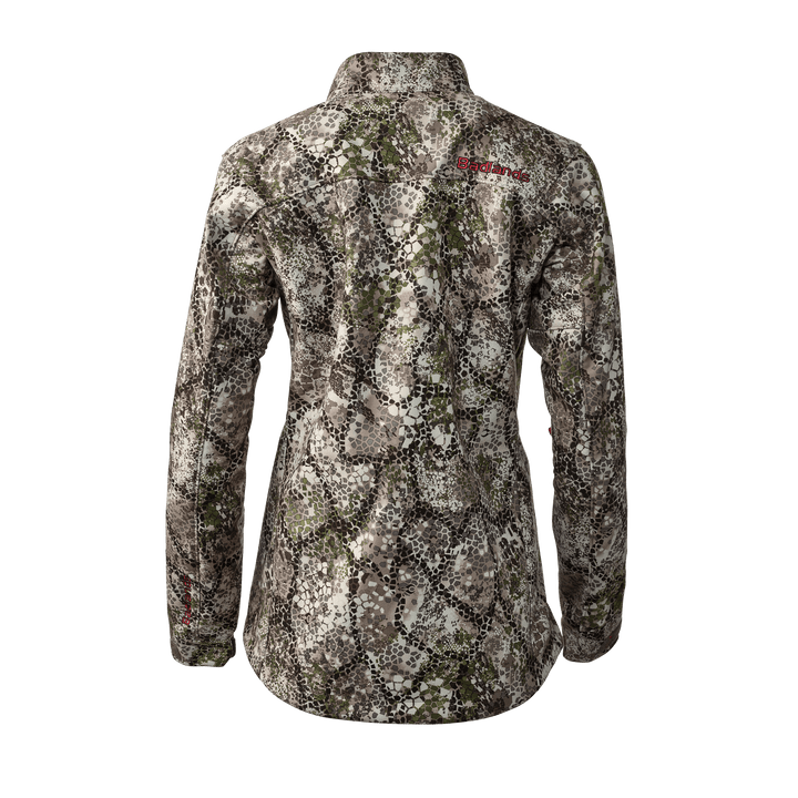 Back view of a women's Badlands camo jacket with red Badlands logo and skull on the upper right shoulder.