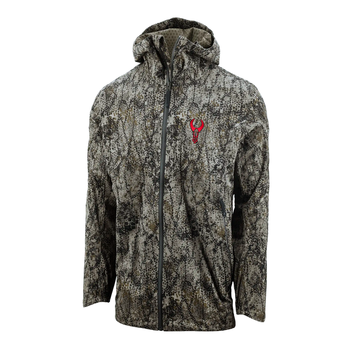 Camo jacket with hood, front zipper, and red Badlands skull logo on chest. Ideal for outdoor or hunting use.