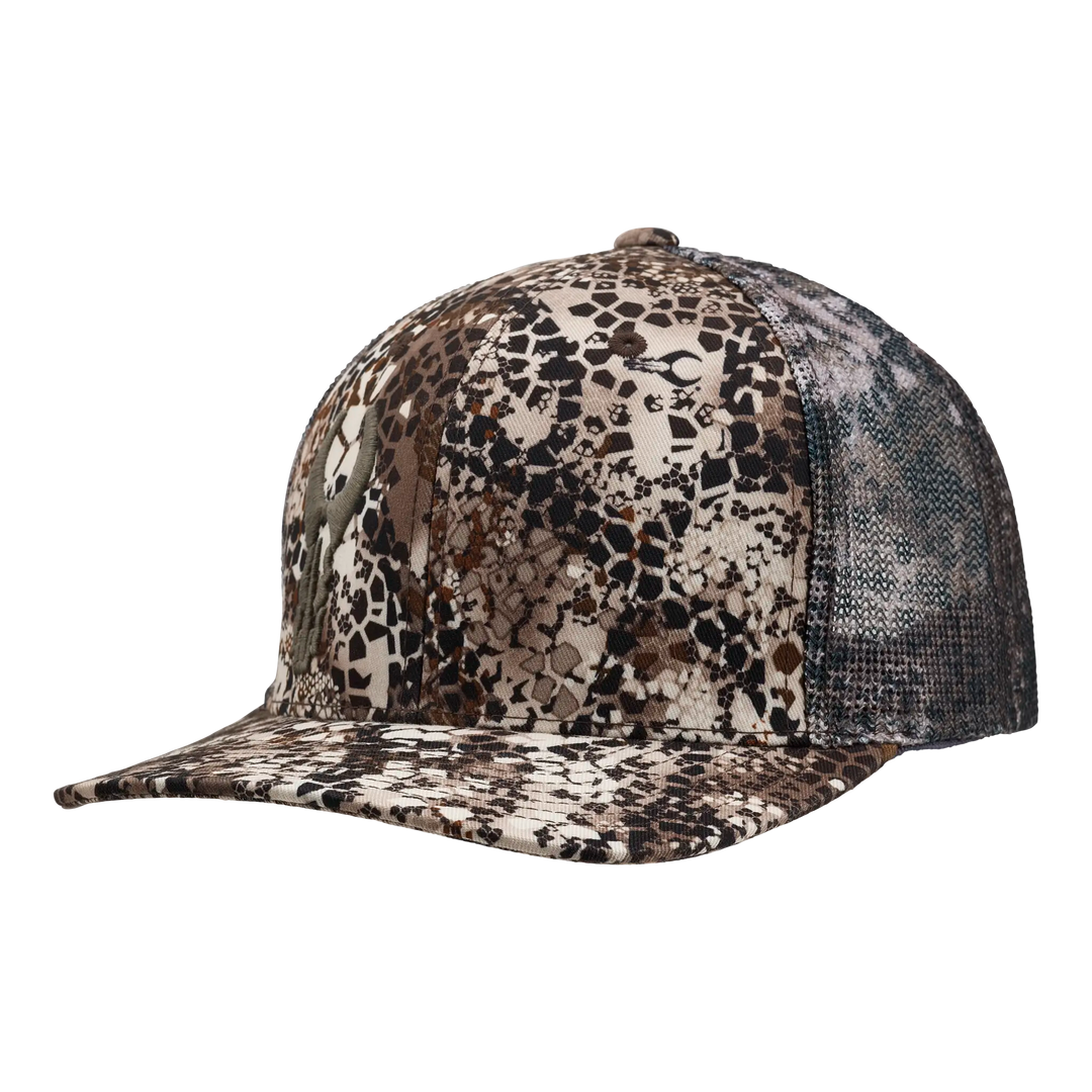 Badlands camo mesh-back cap with subtle skull logo, curved bill, and adjustable fit for outdoor use.
