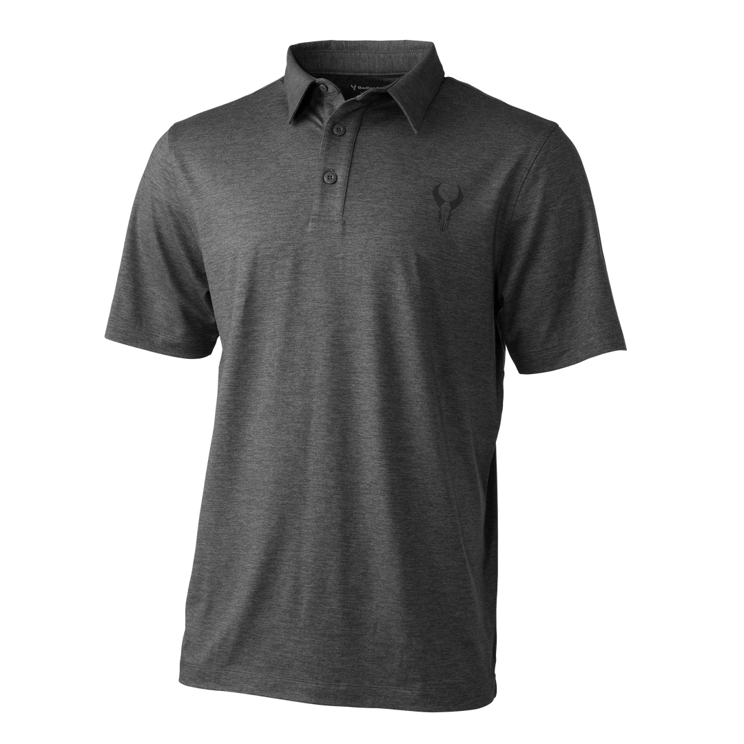 Dark gray Badlands polo shirt with short sleeves and subtle skull logo on left chest.