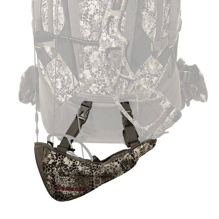 Badlands camo rifle boot attached to a backpack; features Badlands logo with skull on the side.