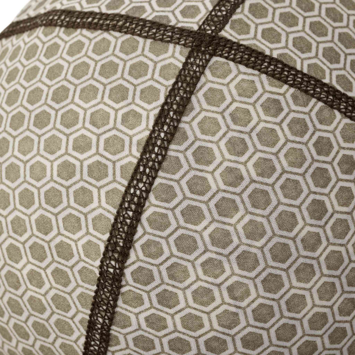 Close-up of Badlands fabric with hexagonal pattern and reinforced stitching; durable material for outdoor gear.