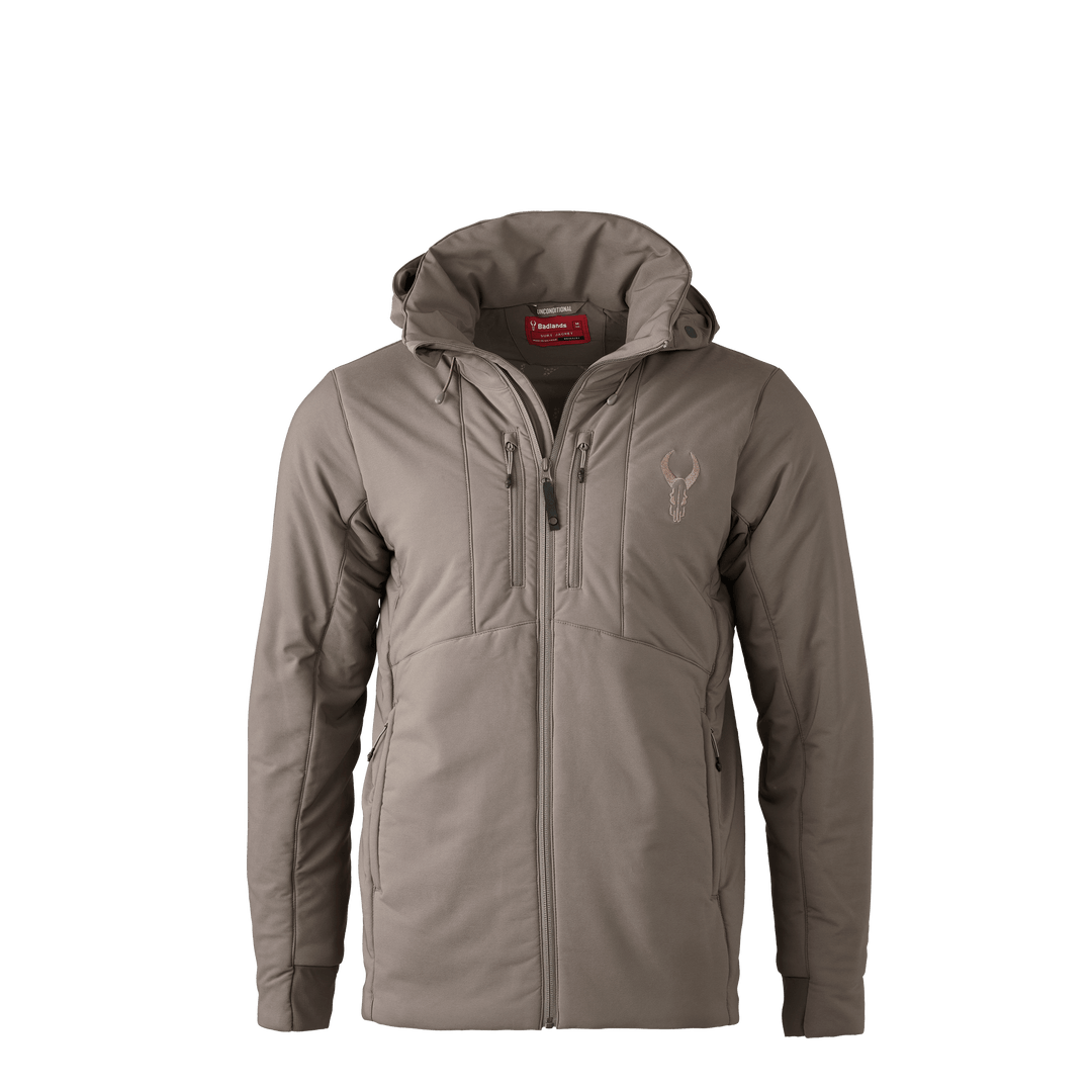 Tan Badlands jacket with hood, front zippers, and Badlands skull logo on left chest.