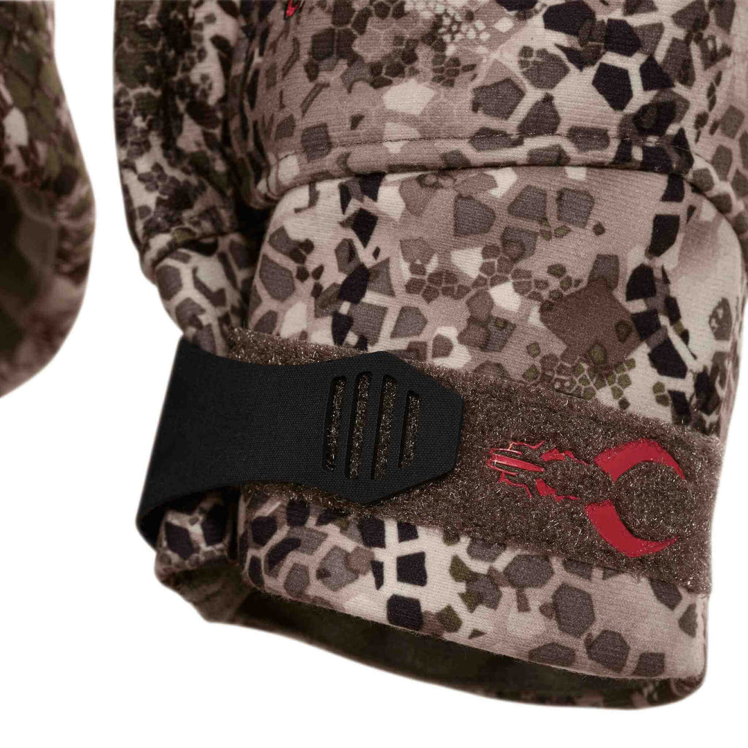 Badlands camo sleeve with adjustable cuff and red Badlands skull logo for easy identification.
