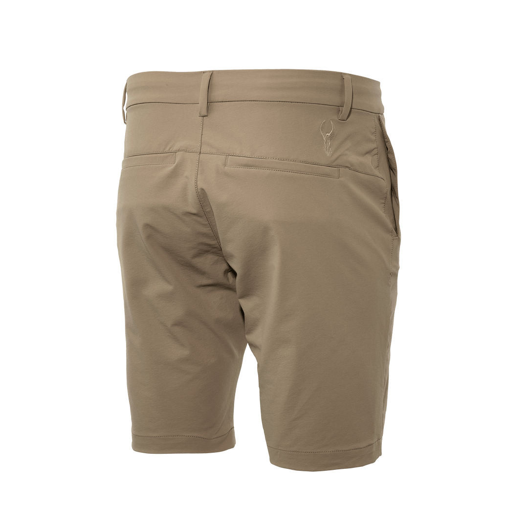 Tan Badlands shorts, rear view, with belt loops, back pockets, and embroidered Badlands skull logo on the right side.