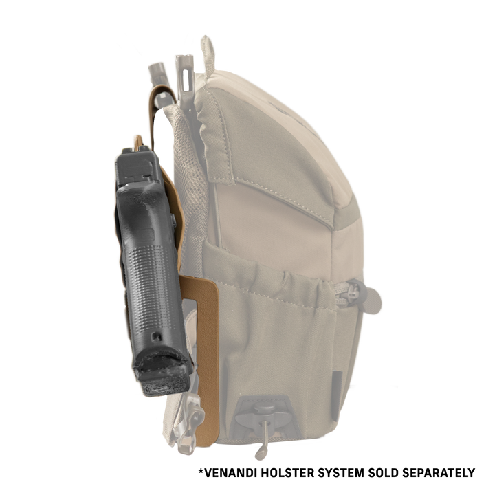 Badlands holster with logo skull, attached to a tan pack; holds a black handgun for secure, accessible carry.