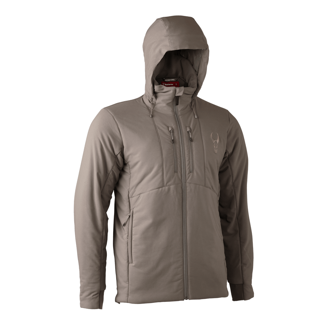 Tan Badlands hooded jacket with front zippers and chest Badlands skull logo. Designed for outdoor use.