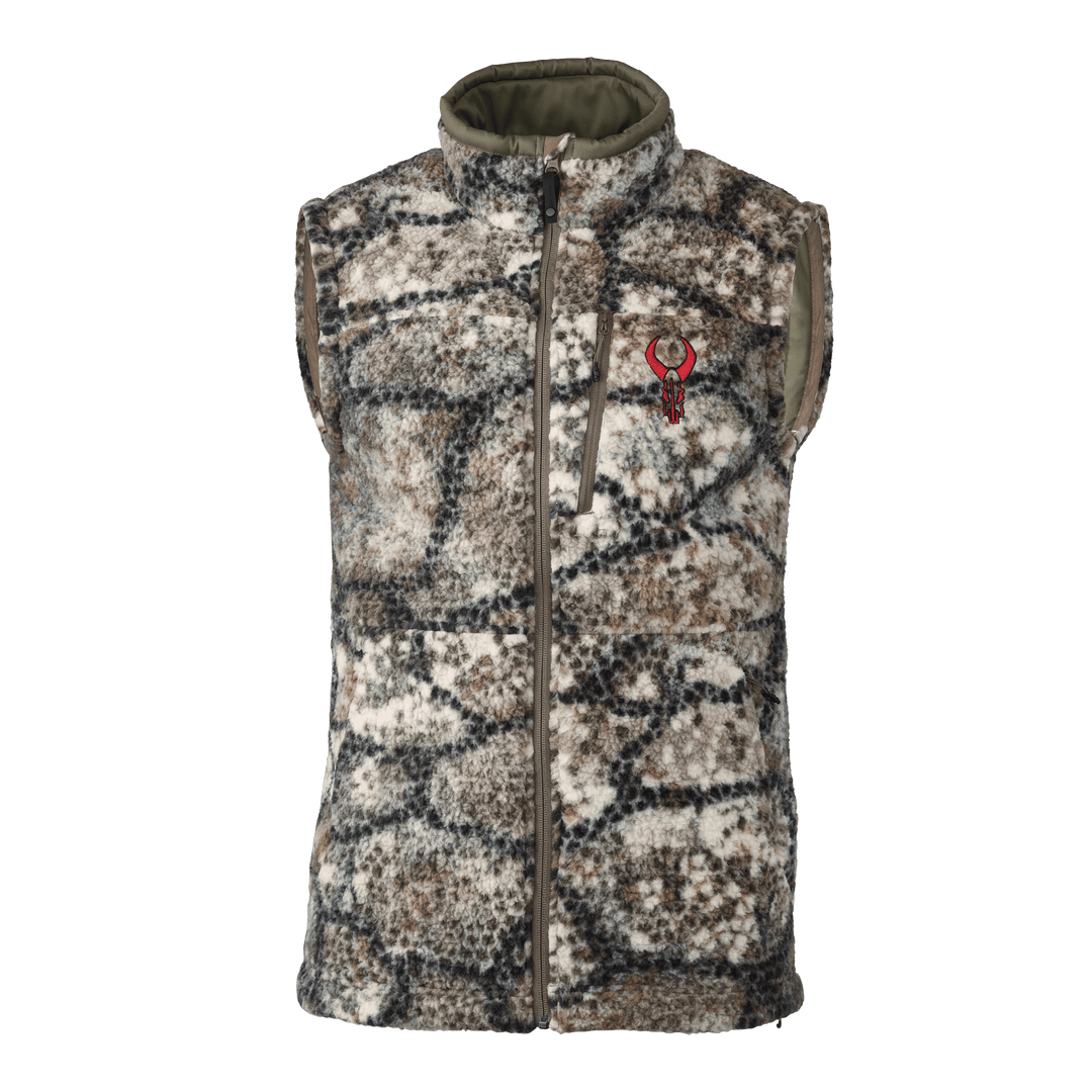 Sleeveless camo fleece vest with front zipper and Badlands skull logo on the chest, designed for outdoor use.