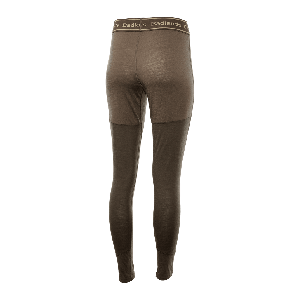 Brown Badlands base layer pants, elastic waistband with Badlands logo and skull, rear view, seamless and tagless design.