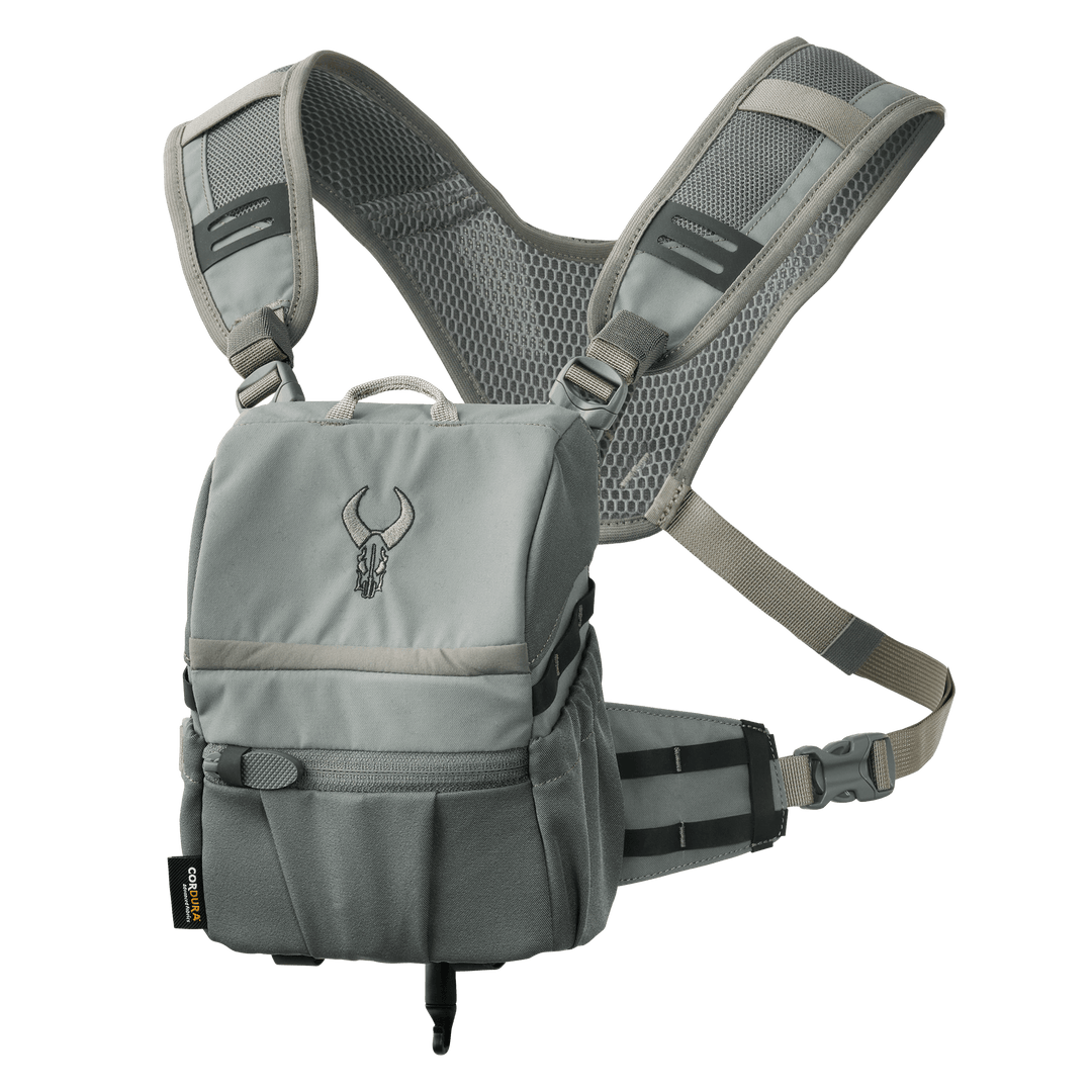 Gray Badlands chest pack with mesh straps and skull logo, designed for outdoor gear organization and easy access.