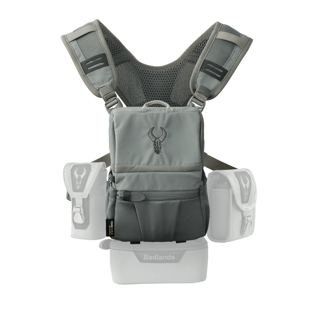 Gray Badlands chest pack with multiple pockets, mesh straps, and Badlands skull logo on front and side pouches.