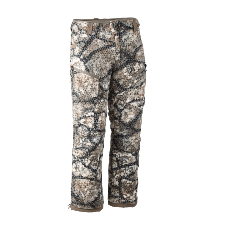 Badlands camo hunting pants with cargo pockets and Badlands skull logo on right leg, shown on white background.