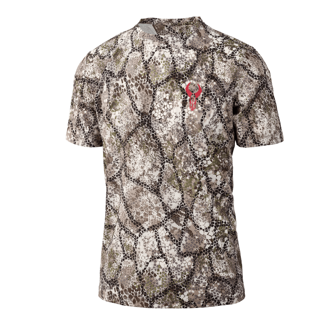 Badlands camo shirt with red skull logo on chest, featuring a natural pattern for outdoor and hunting use.