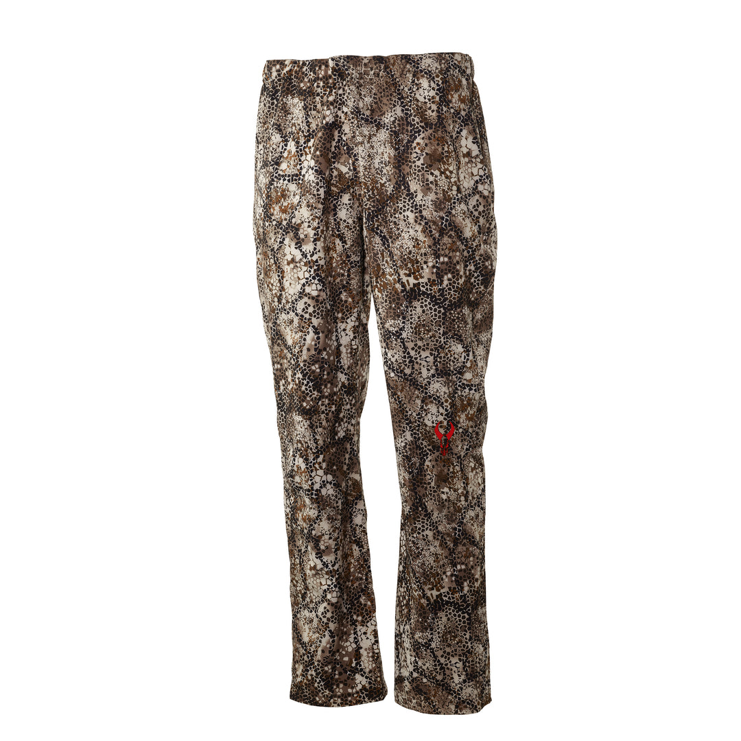 Badlands camo hunting pants with red skull logo on leg, shown against a white background.