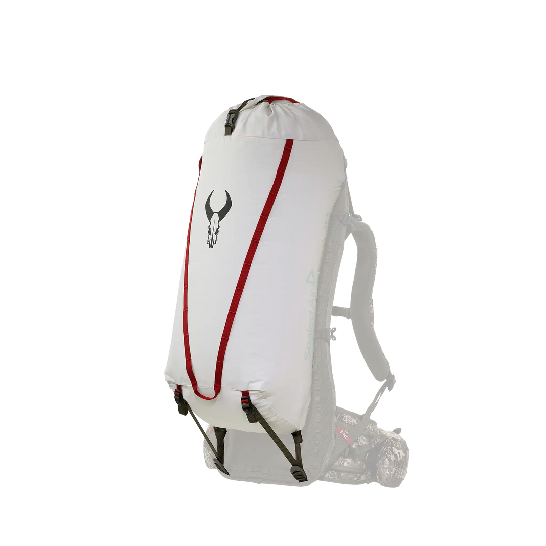 White Badlands backpack with red accents and skull logo, shown on a transparent background for clear product visibility.