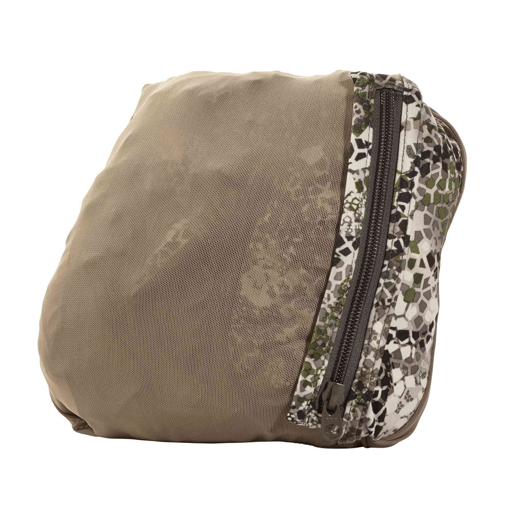 Tan and camo Badlands pouch with zipper closure, featuring the Badlands skull logo on the zipper pull.