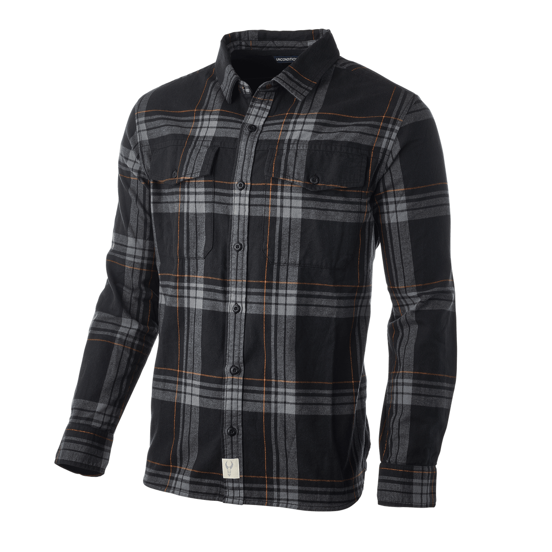 Black and gray plaid Badlands shirt with orange stripes, button front, chest pockets, and skull logo tag at hem.