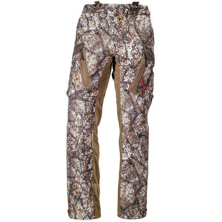 Badlands camo hunting pants with zippered pockets and red skull logo on right thigh, shown on white background.