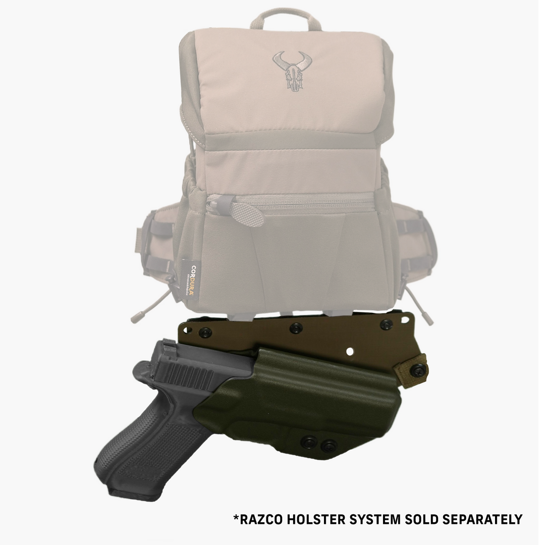 Tan Badlands backpack with skull logo, shown with Razco holster system for handgun. Holster sold separately.