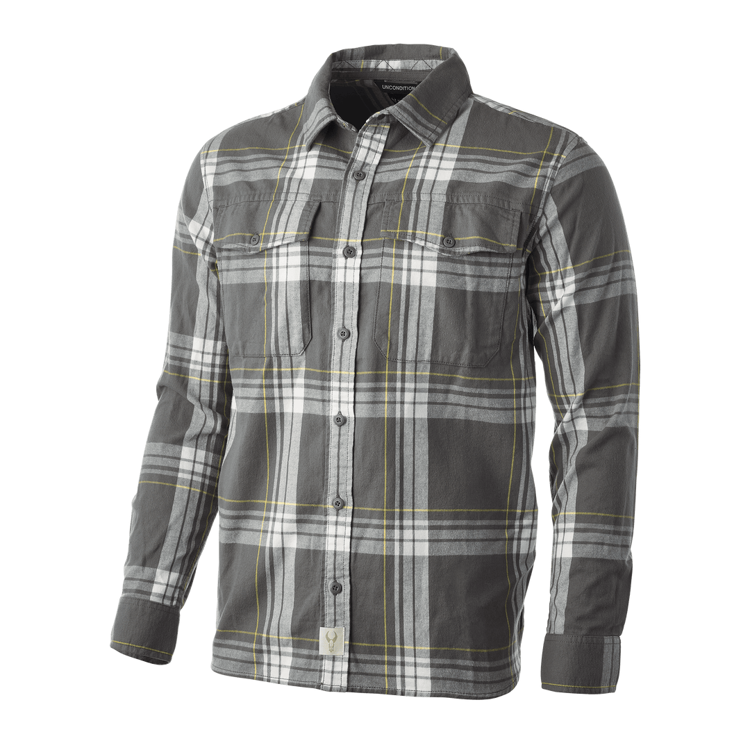 Gray plaid Badlands shirt with long sleeves, button front, chest pockets, and Badlands skull logo tag at the hem.