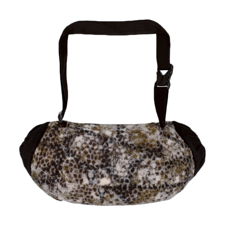 Badlands camo muff handwarmer with adjustable strap and soft fleece exterior; features the Badlands skull logo.