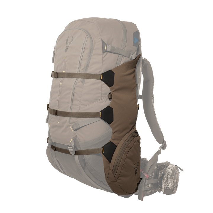 Brown Badlands hunting backpack with skull logo, padded straps, and multiple compartments, shown on a white background.