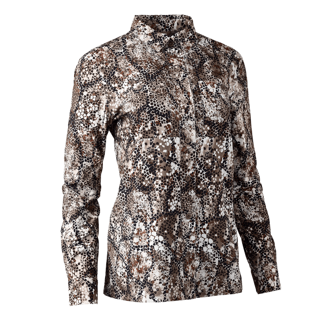 Women's long-sleeve camo shirt in Badlands Approach pattern, featuring the Badlands skull logo on the chest pocket.