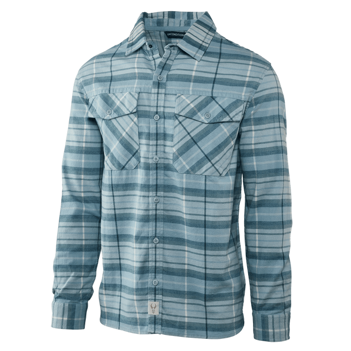 Light blue plaid Badlands shirt with long sleeves, button front, chest pockets, and skull logo tag at hem.