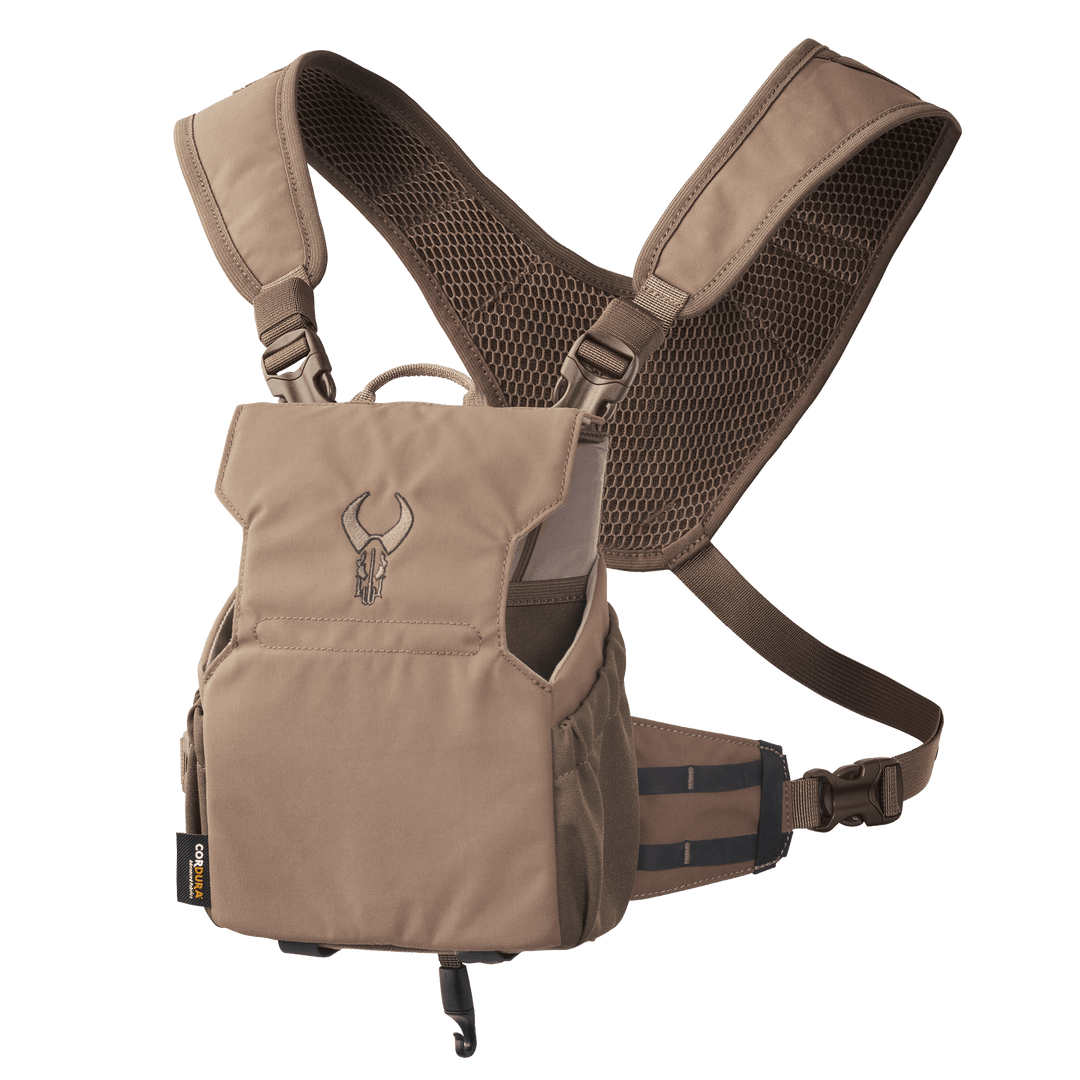 Tan Badlands chest pack with mesh shoulder straps and Badlands skull logo on front; designed for outdoor gear organization.
