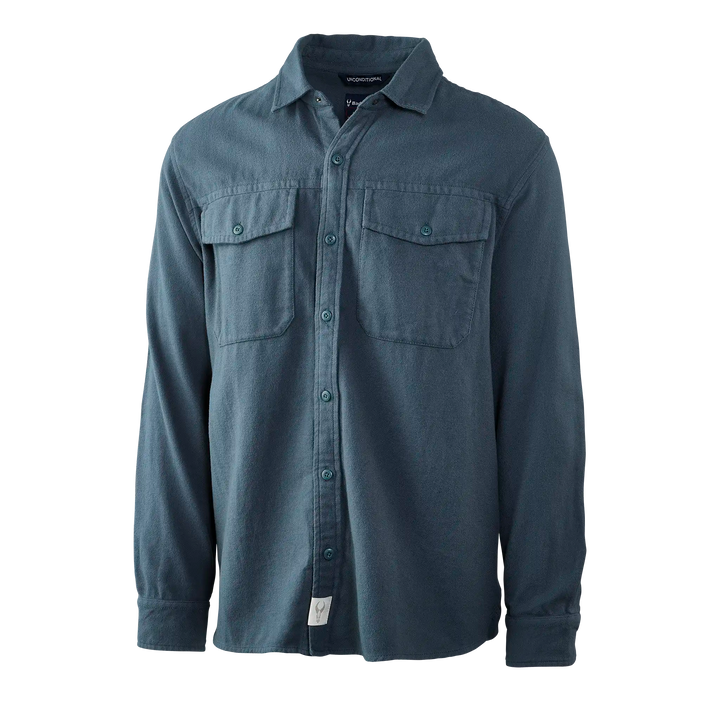 Long-sleeve blue Badlands shirt with two chest pockets and Badlands skull logo tag at the hem.