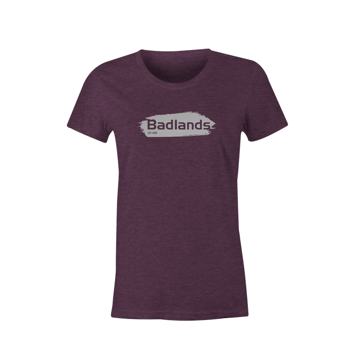 Purple women's t-shirt with Badlands logo and skull graphic on chest, short sleeves, crew neck.