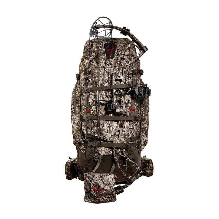 Camo Badlands hunting backpack with bow holder and red skull logo, designed for outdoor and archery gear transport.