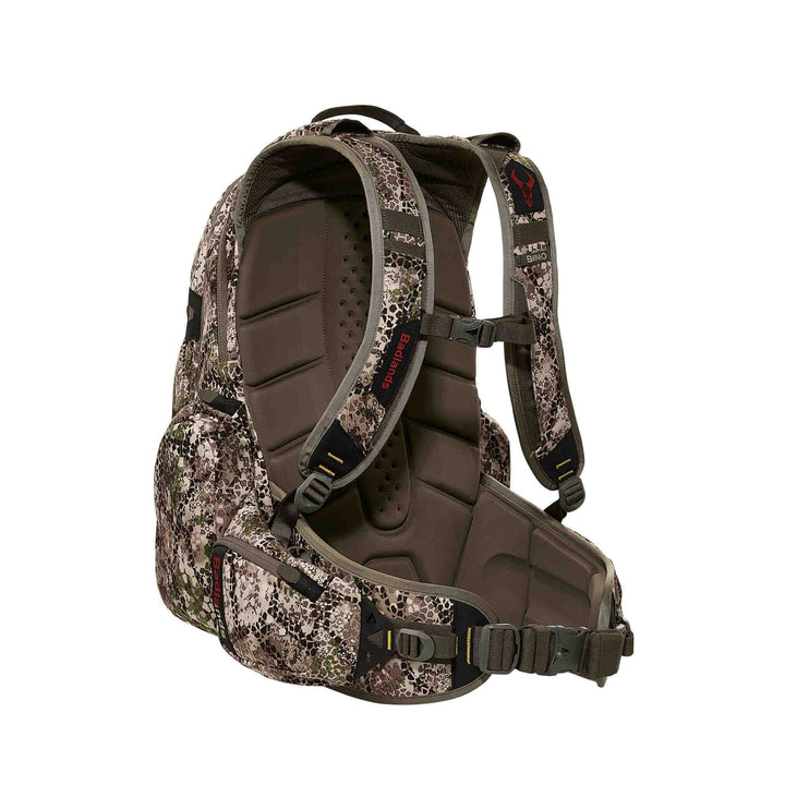 Badlands camo hunting backpack with padded straps, ergonomic back panel, and red Badlands skull logo on the shoulder strap.