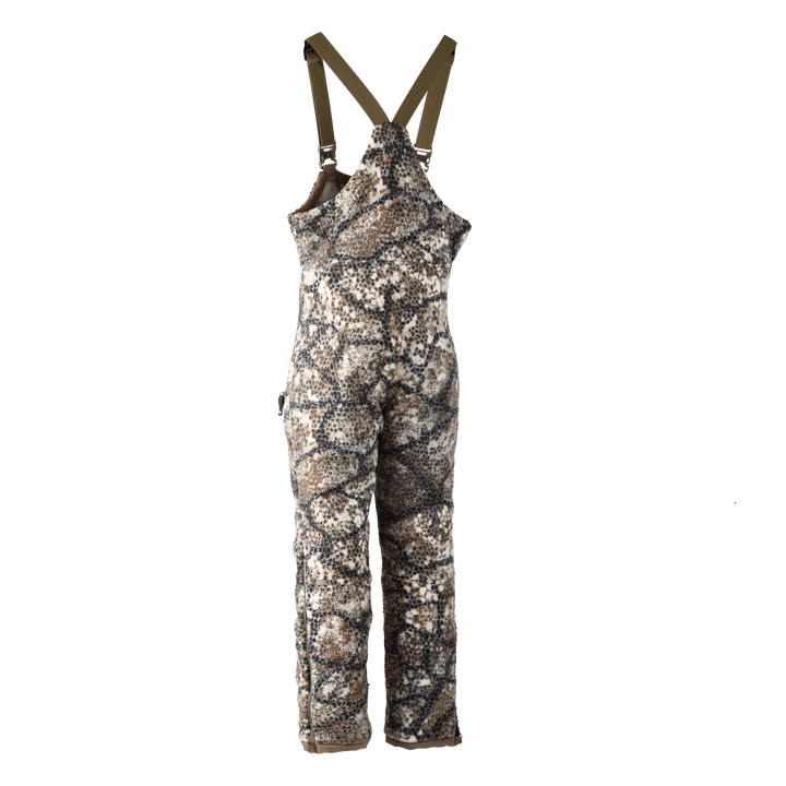 Badlands camo hunting bib with adjustable straps and skull logo, designed for outdoor use and weather protection.