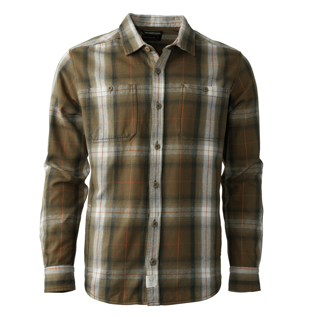 Olive plaid Badlands flannel shirt with long sleeves and logo skull tag at hem, shown on a plain background.