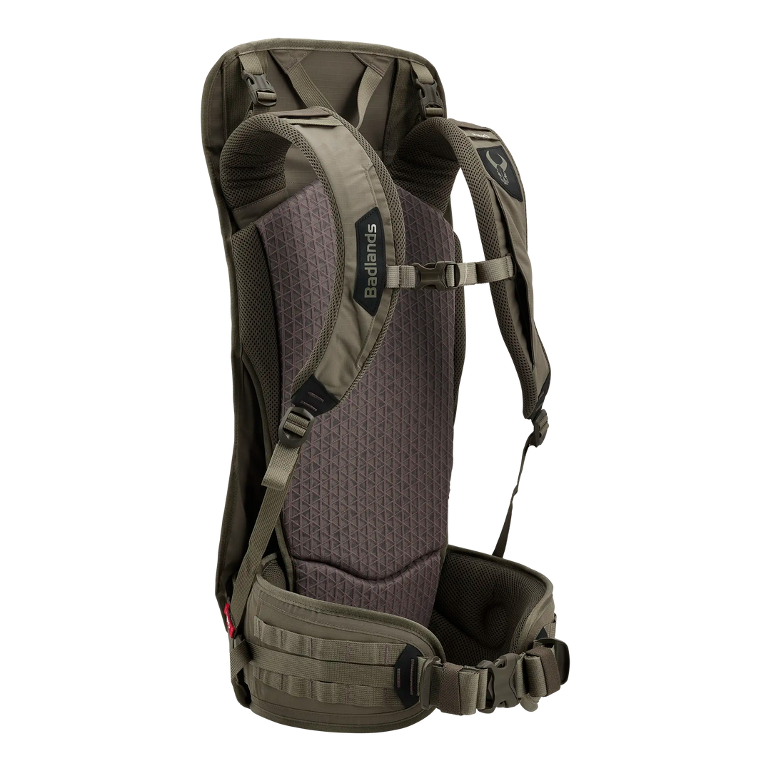 Back view of a Badlands hunting backpack with padded straps and the Badlands skull logo on the right shoulder strap.