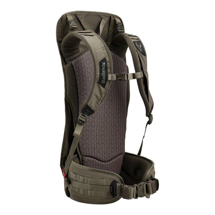 Back view of a Badlands hunting backpack with padded straps and the Badlands skull logo on the right shoulder strap.