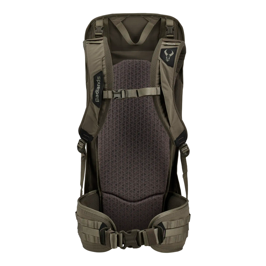 Back view of a Badlands backpack with padded straps and skull logo for ergonomic support and brand identification.