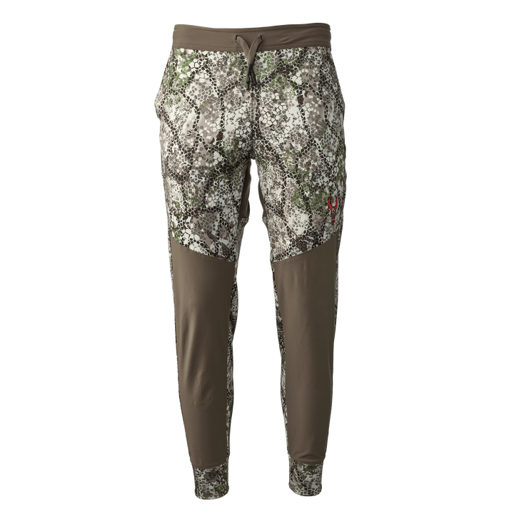 Badlands camo jogger pants with drawstring waist and red skull logo on right leg.