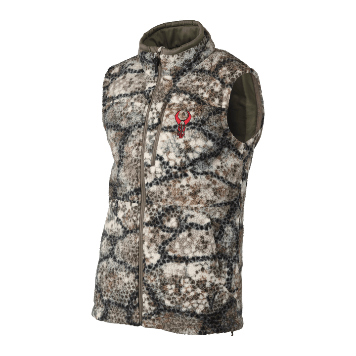 Sleeveless camo fleece vest with front zipper and red Badlands skull logo on chest. High collar, two pockets.
