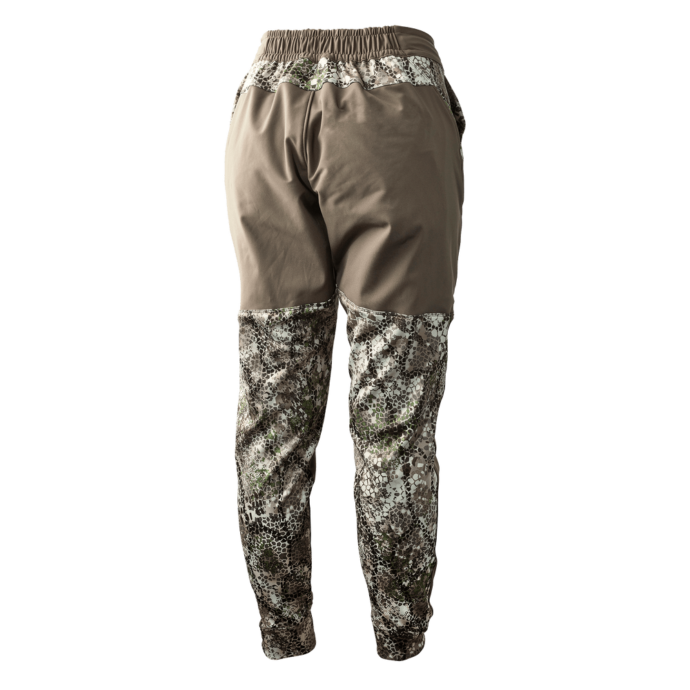 Badlands women's camo hunting pants with stretch waistband and Badlands skull logo on front.
