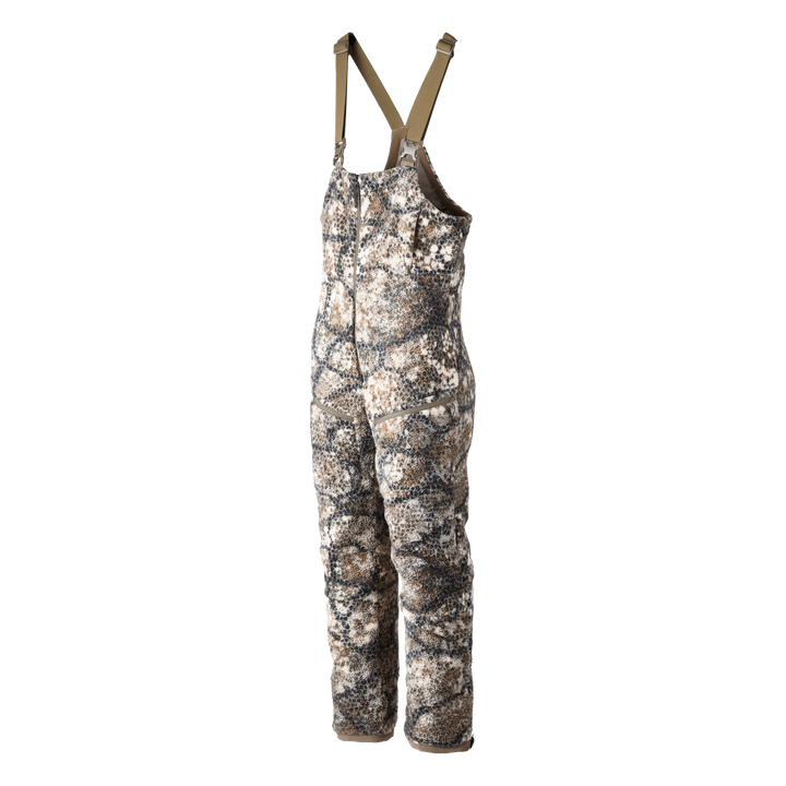 Badlands camo hunting bib with adjustable straps, insulated for cold weather. Badlands skull logo on chest.
