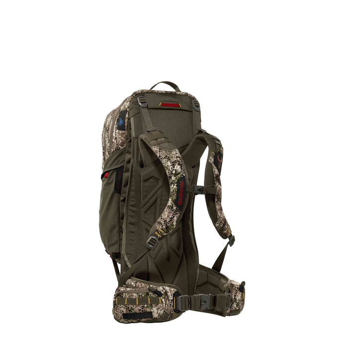Badlands hunting backpack in camo, ergonomic straps, and skull logo on shoulder; shown from rear angle.