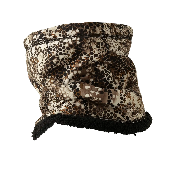 Badlands camo neck gaiter with fleece lining; features Badlands skull logo for outdoor and hunting use.