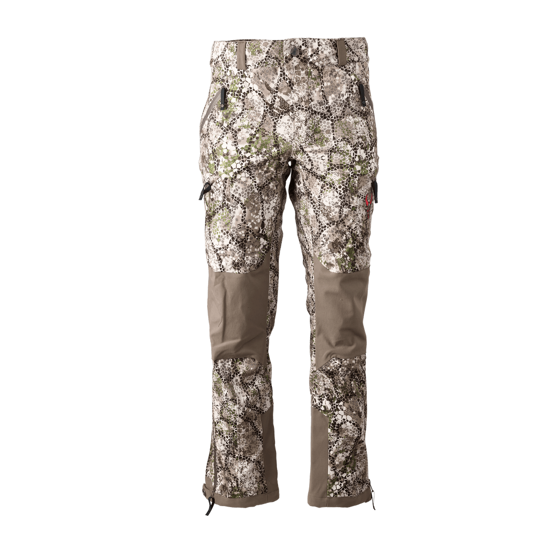 Badlands camo hunting pants with reinforced knees and Badlands skull logo, shown front view on white background.