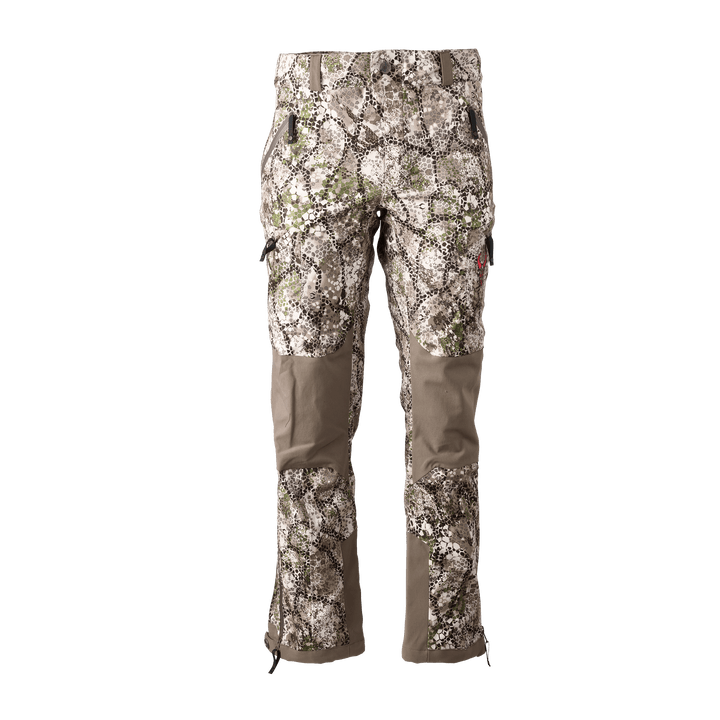 Badlands camo hunting pants with reinforced knees and Badlands skull logo, shown front view on white background.