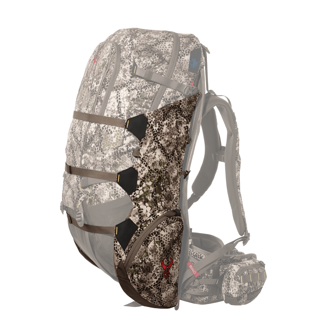 Camo Badlands hunting backpack with padded straps and red Badlands skull logo on side pocket, shown on white background.